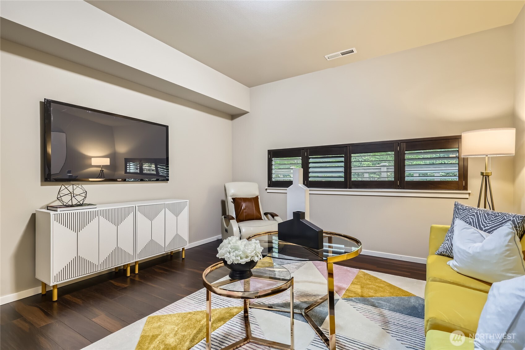 3702 170th Place Southeast Bothell, WA 98012 - Photo 37 of 40 a living room with furniture and a flat screen tv