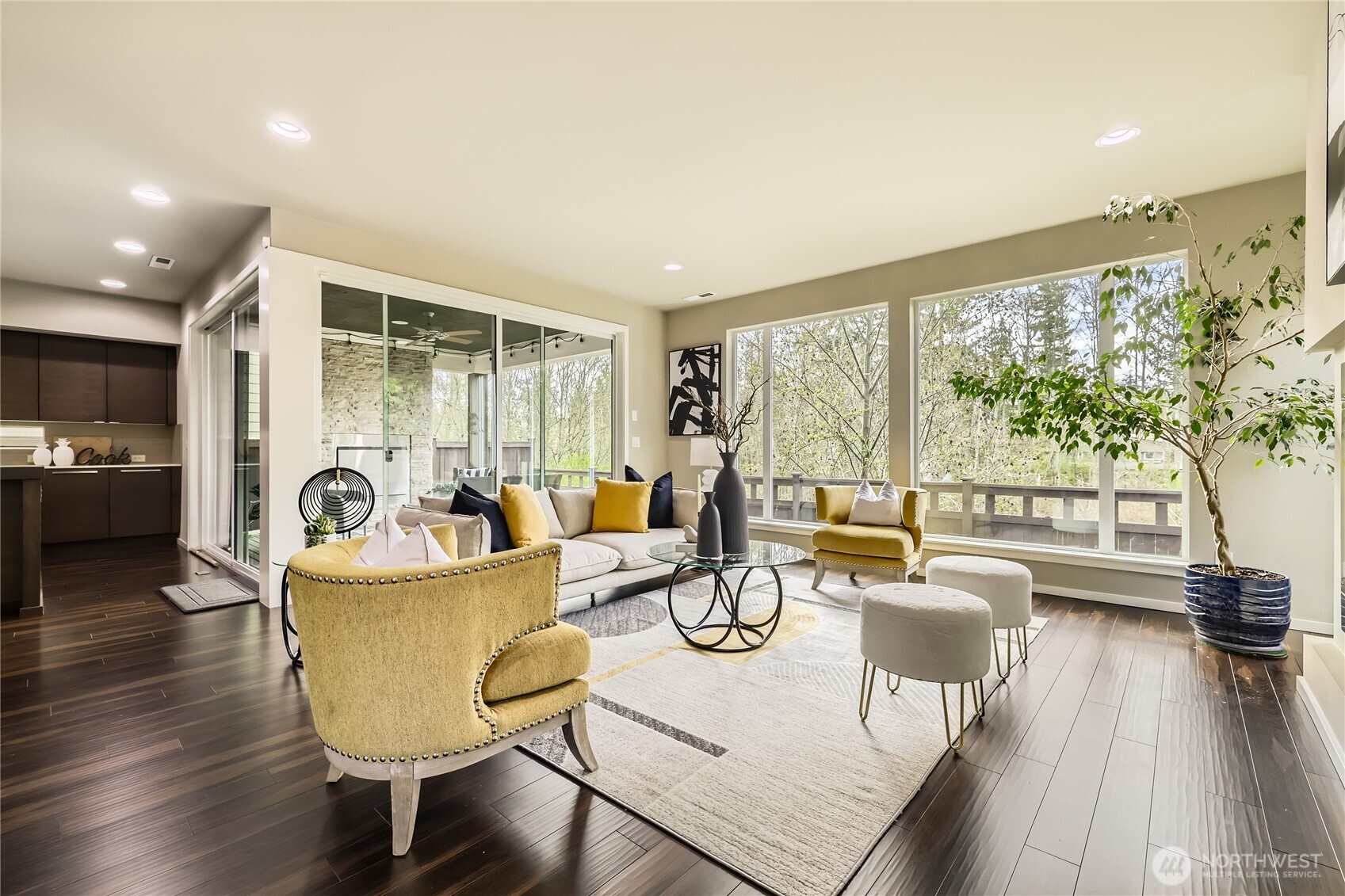 3702 170th Place Southeast Bothell, WA 98012 - Photo 4 of 40 a living room with fireplace furniture and a large window