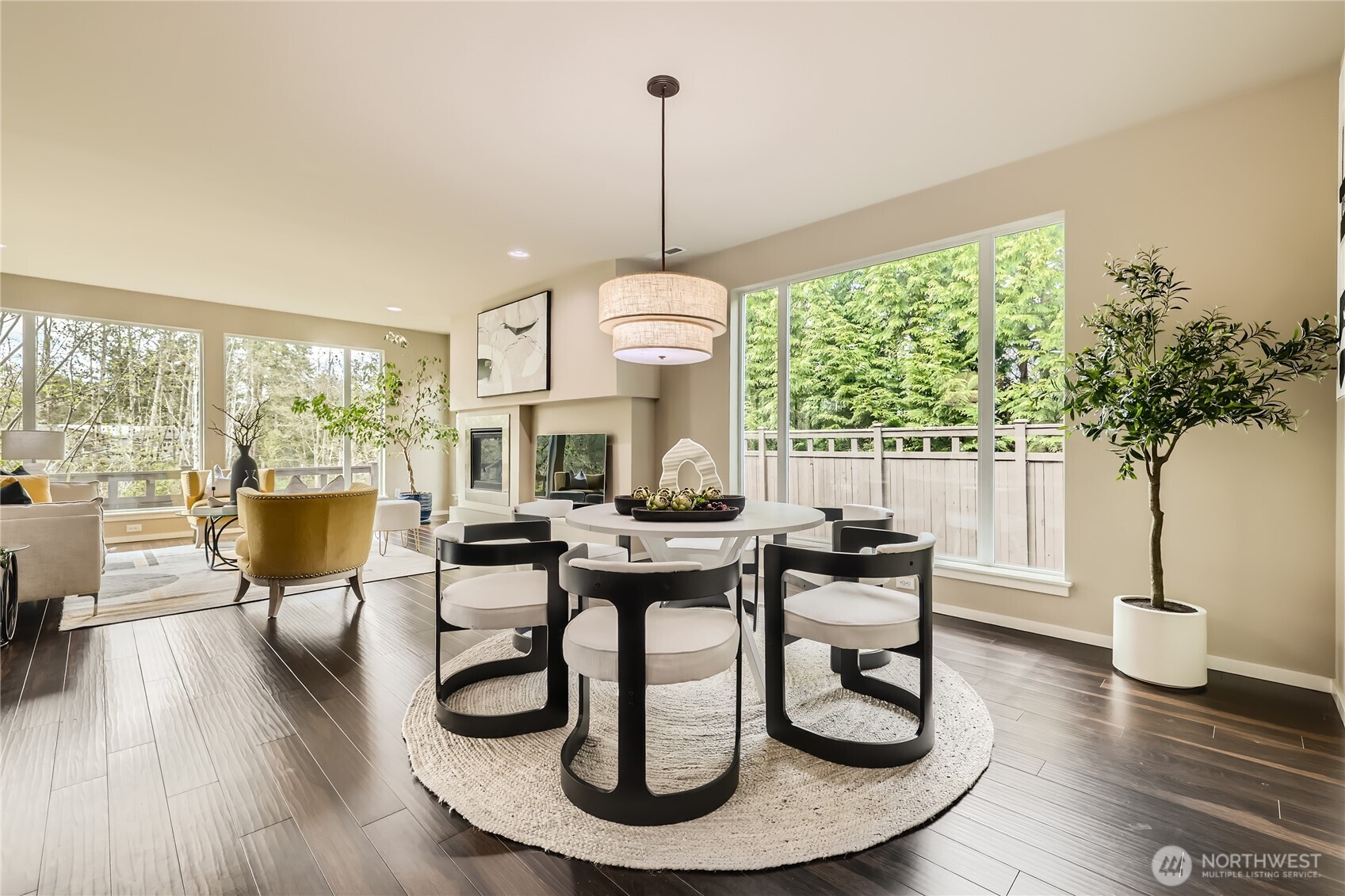 3702 170th Place Southeast Bothell, WA 98012 - Photo 7 of 40 a living room with furniture a window and a chandelier