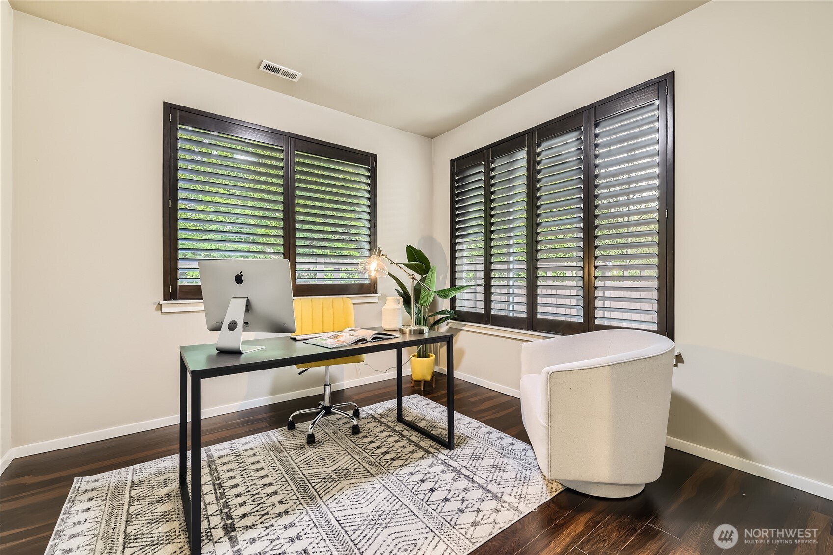 3702 170th Place Southeast Bothell, WA 98012 - Photo 9 of 40 a view of a workspace with furniture and a window