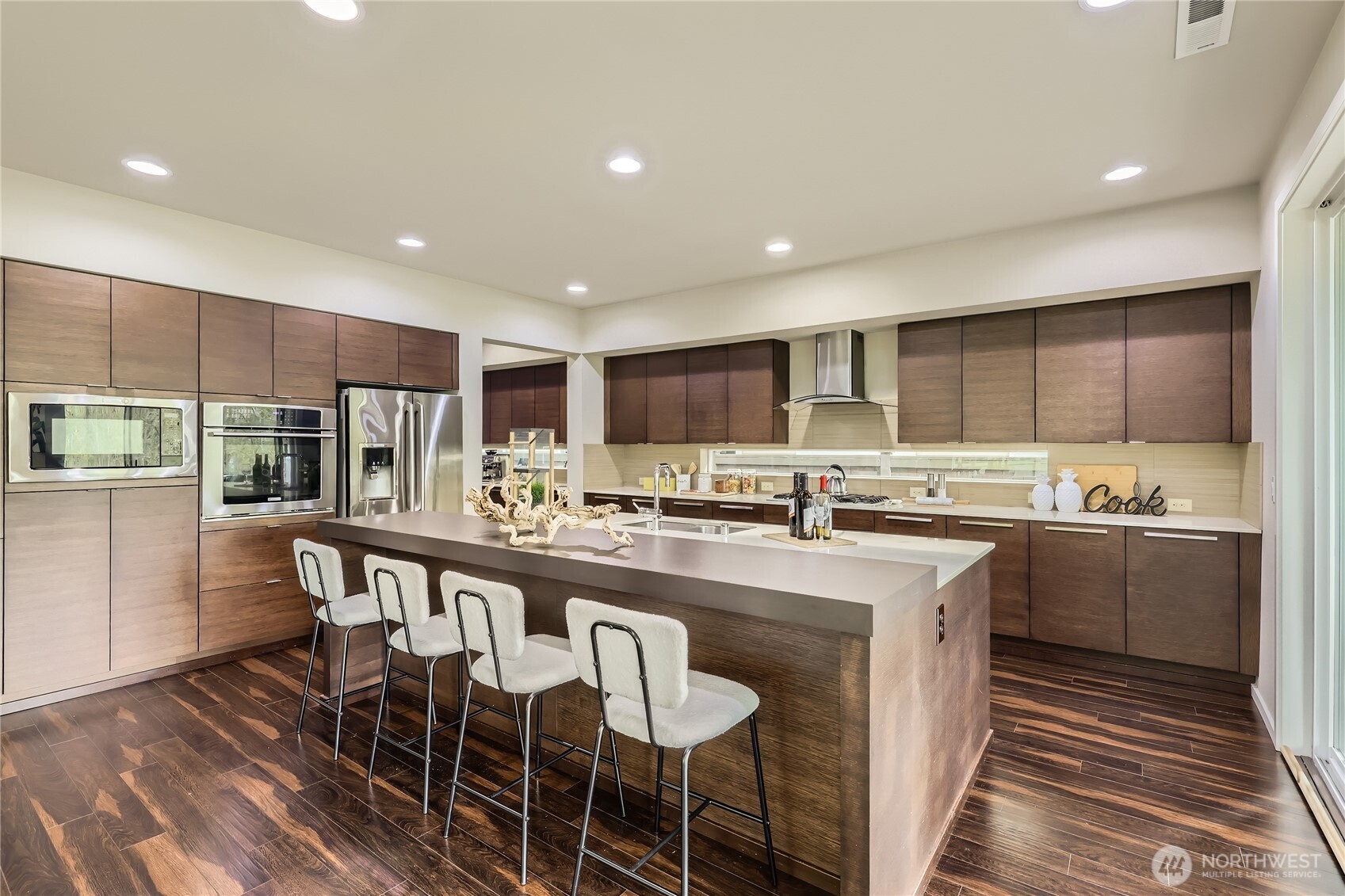 3702 170th Place Southeast Bothell, WA 98012 - Photo 10 of 40 a large kitchen with kitchen island a island in it