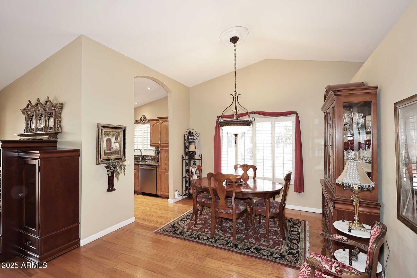 9025 West Marco Polo Road Peoria, AZ 85382 - Photo 11 of 38 a view of a dining room with furniture