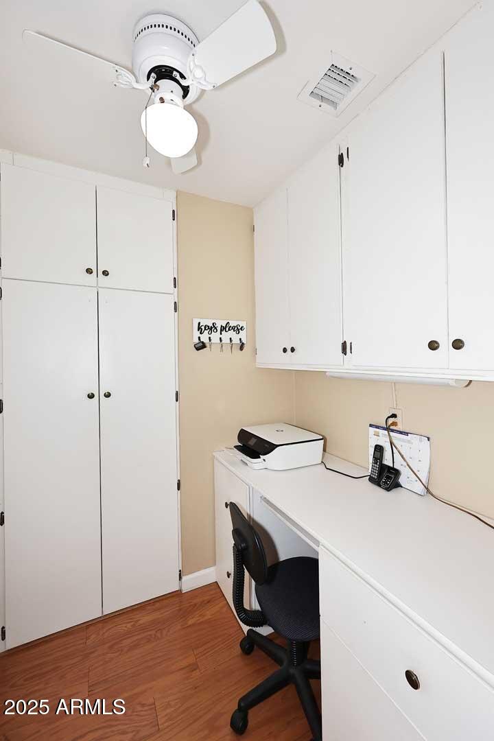 9025 West Marco Polo Road Peoria, AZ 85382 - Photo 16 of 38 a view of a workspace with washer and dryer