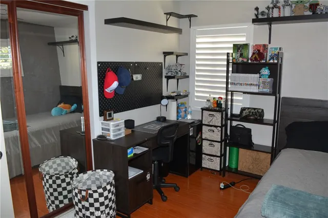 a view of a workspace with furniture