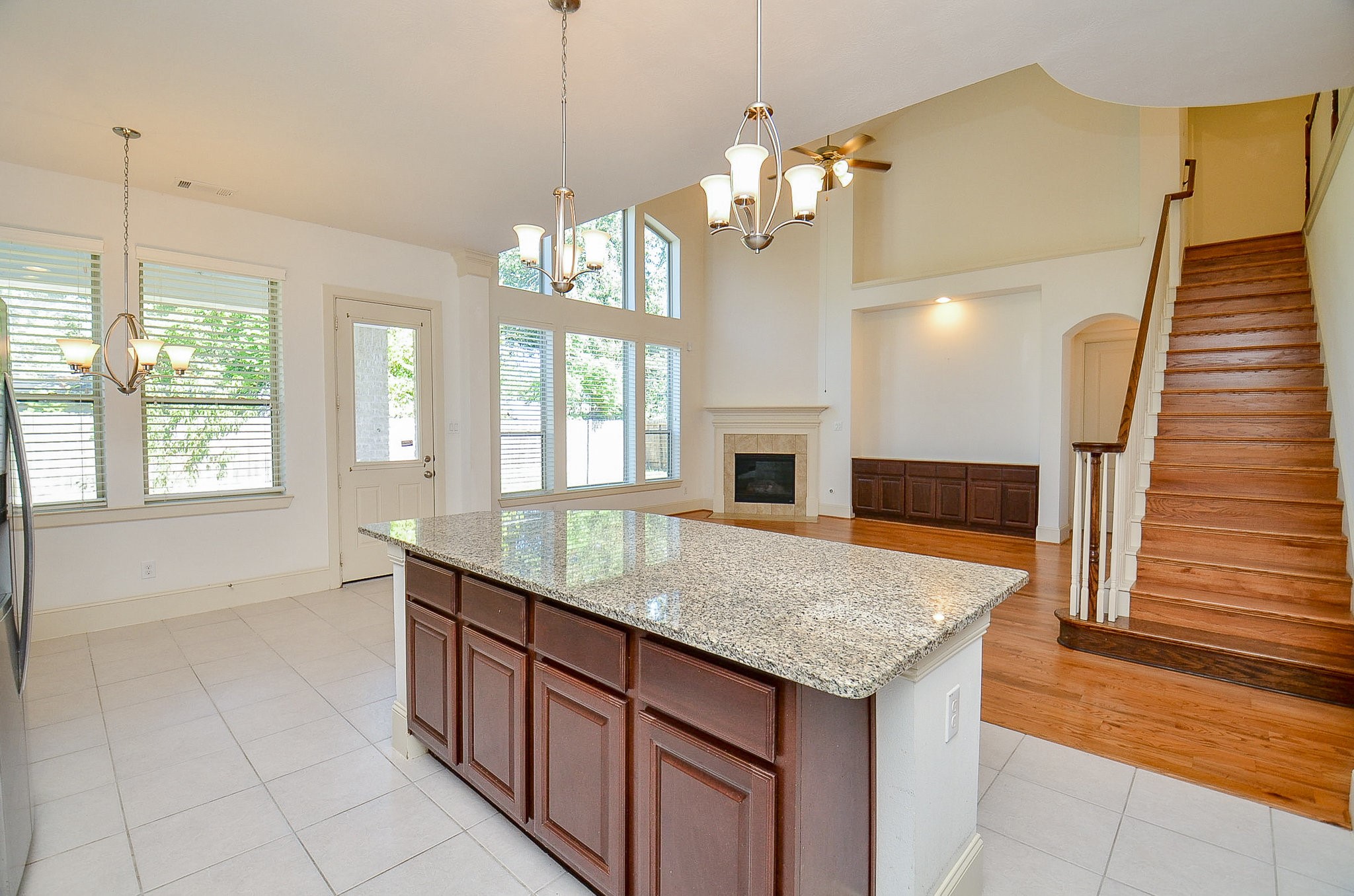 3302 Rochdale Street Houston, TX 77025 - Photo 14 of 49 a kitchen with kitchen island granite countertop a stove and a sink