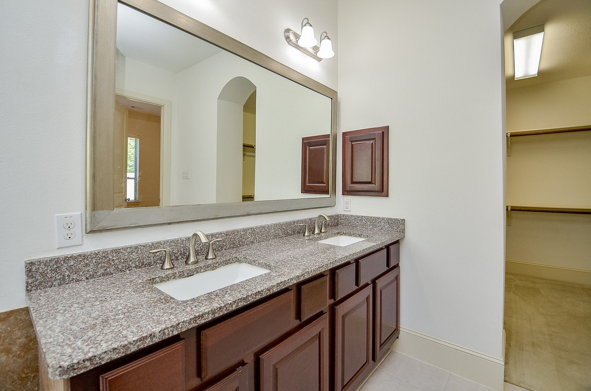 3302 Rochdale Street Houston, TX 77025 - Photo 22 of 49 a bathroom with a granite countertop sink and a mirror