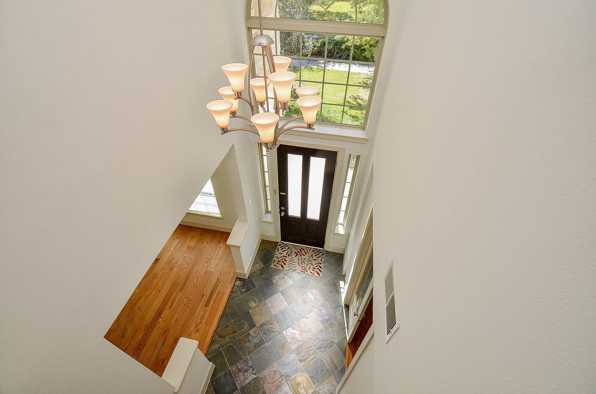 3302 Rochdale Street Houston, TX 77025 - Photo 32 of 49 a view of entryway and hall with wooden floor