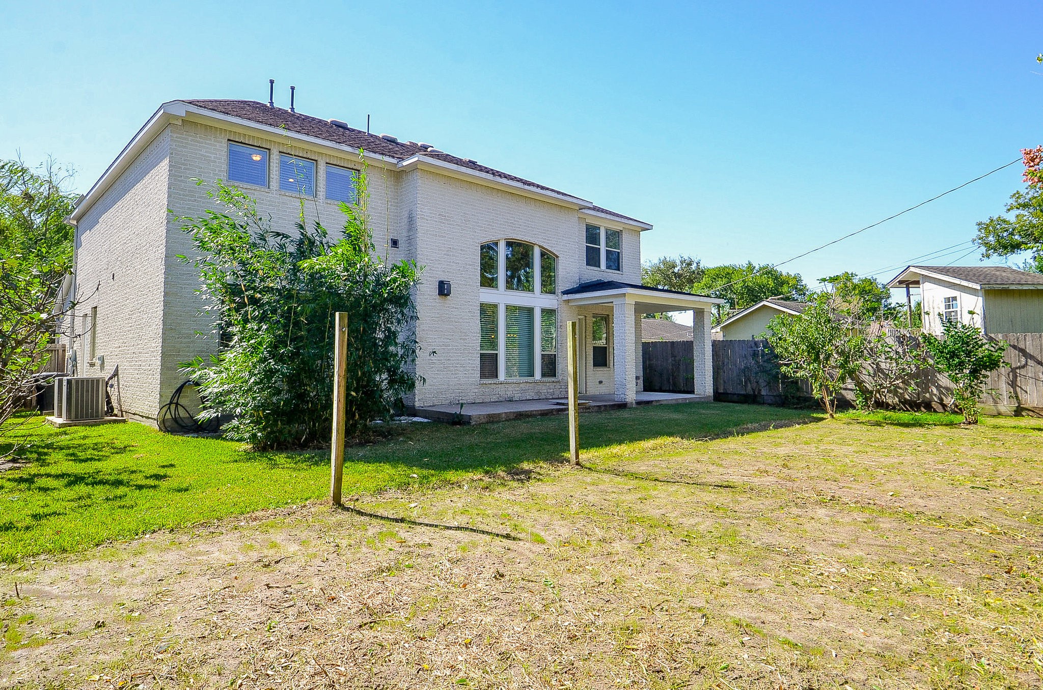 3302 Rochdale Street Houston, TX 77025 - Photo 44 of 49 a front view of a house with a yard