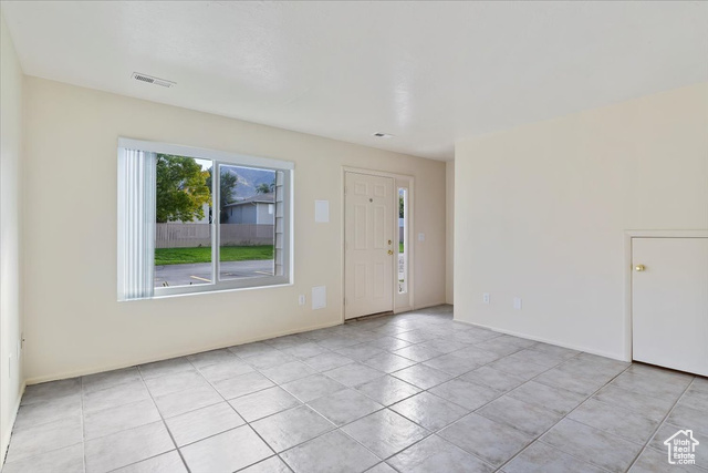 947 Canyon Road South, Unit 15 Ogden, UT 84404 - Photo 2 of 22 Foyer entrance featuring light tile patterned floors and baseboards
