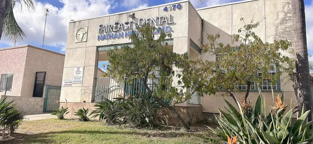 a street sign on a pole on a street
