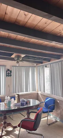 a room with furniture and window