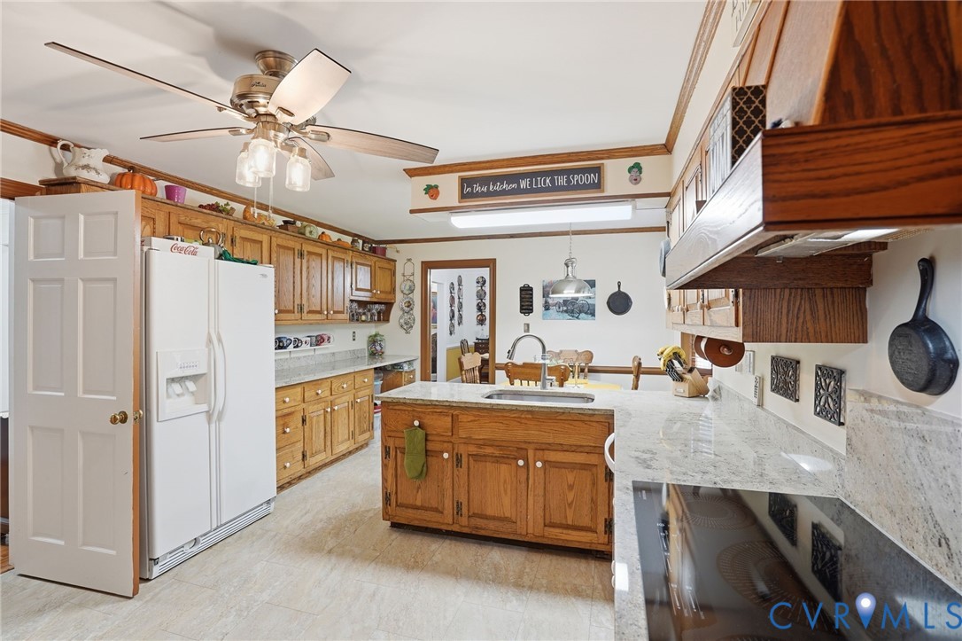 11016 Pridesville Road Amelia Court House, VA 23002 - Photo 27 of 54 Kitchen featuring light wood cabinetry, light-tone