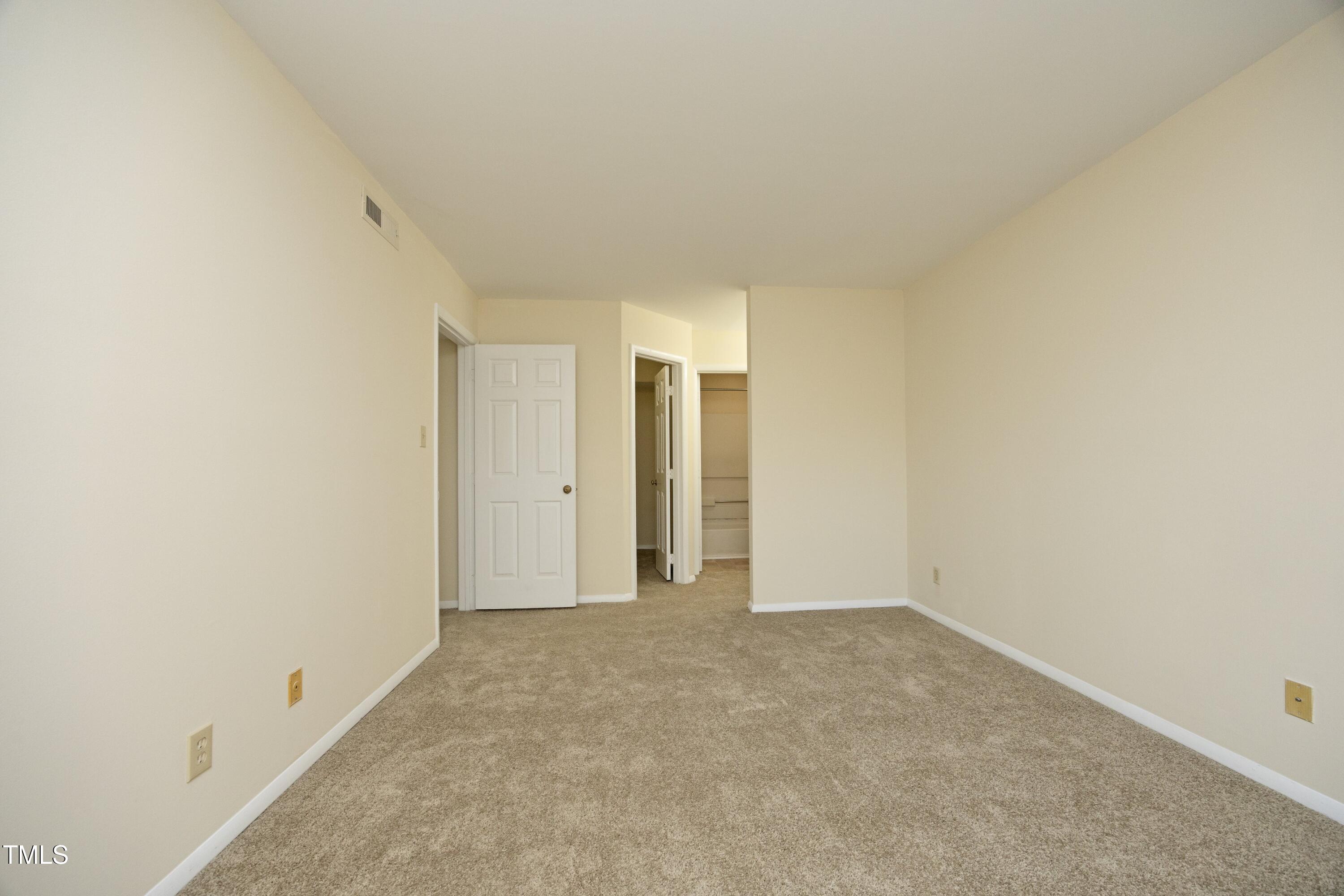 3706 Chimney Ridge Place, Unit 103 Durham, NC 27713 - Photo 22 of 32 Primary Bedroom with Ensuite Full Bath
