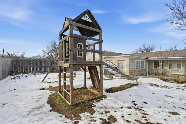a view of a park with a slide