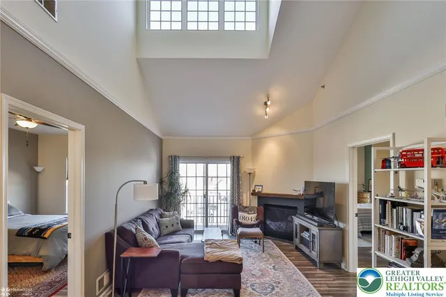 a living room with furniture and a table