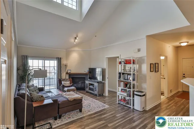a living room with furniture and a table