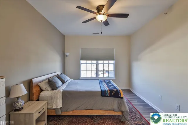 an aerial view of a house with a garden