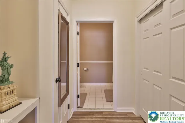 a room with gym equipment and a table