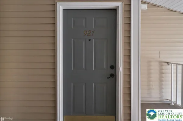 a view of a bathroom with a sink and a mirror