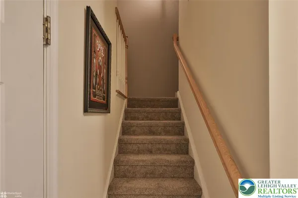 a view of a bathroom from the hallway