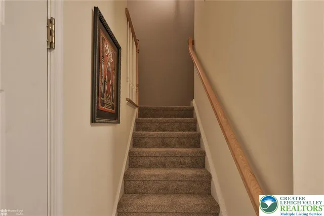 a view of a bathroom from the hallway