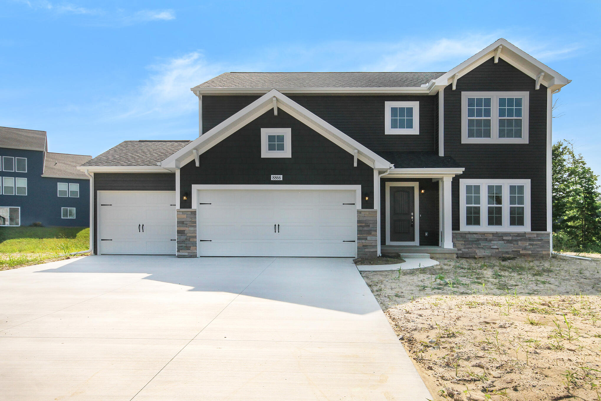 3233 Railtown Road Caledonia, MI 49316 - Photo 1 of 37 STG071-E2390 V7.0 Elevation A2