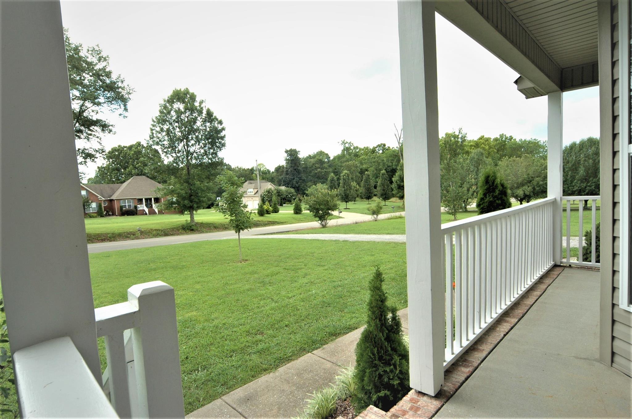 1961 Lasea Road Spring Hill, TN 37174 - Photo 17 of 18 a view of a bench in a park