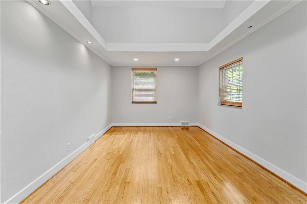 116 Elmore Road Pittsburgh, PA 15221 - Photo 11 of 16 a view of a room with wooden floor and window