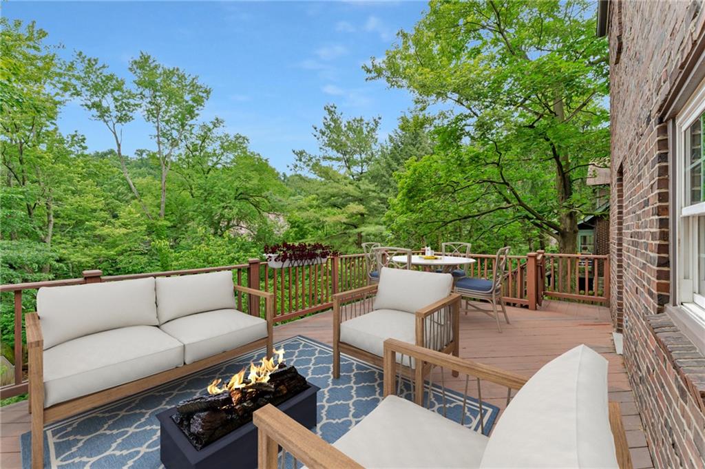 116 Elmore Road Pittsburgh, PA 15221 - Photo 9 of 16 a view of a patio with couches table and chairs and potted plants