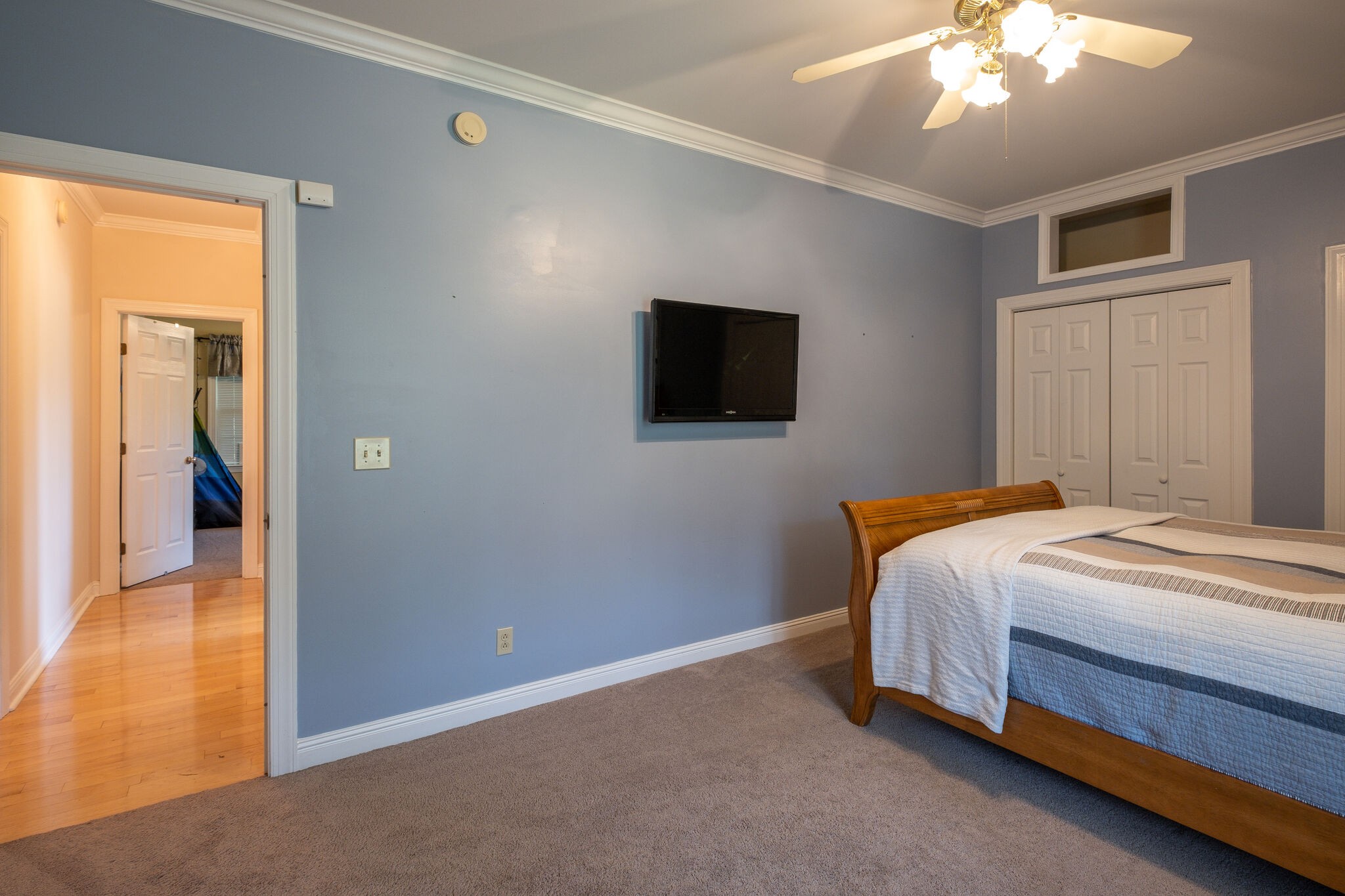 278 Vesta Road Lebanon, TN 37090 - Photo 23 of 44 a bedroom with a bed and a flat screen tv