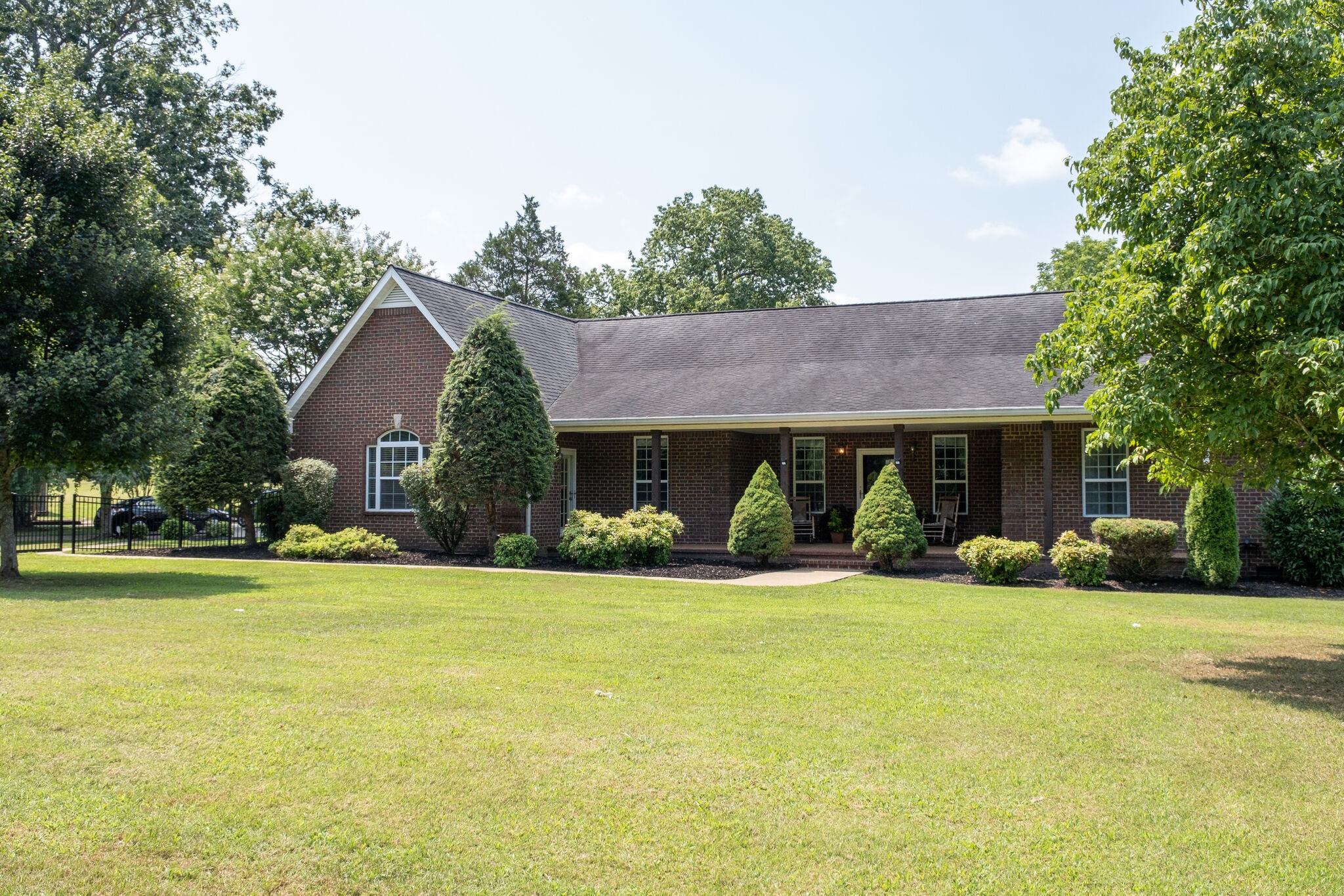 278 Vesta Road Lebanon, TN 37090 - Photo 4 of 44 a view of a house with a yard and plants