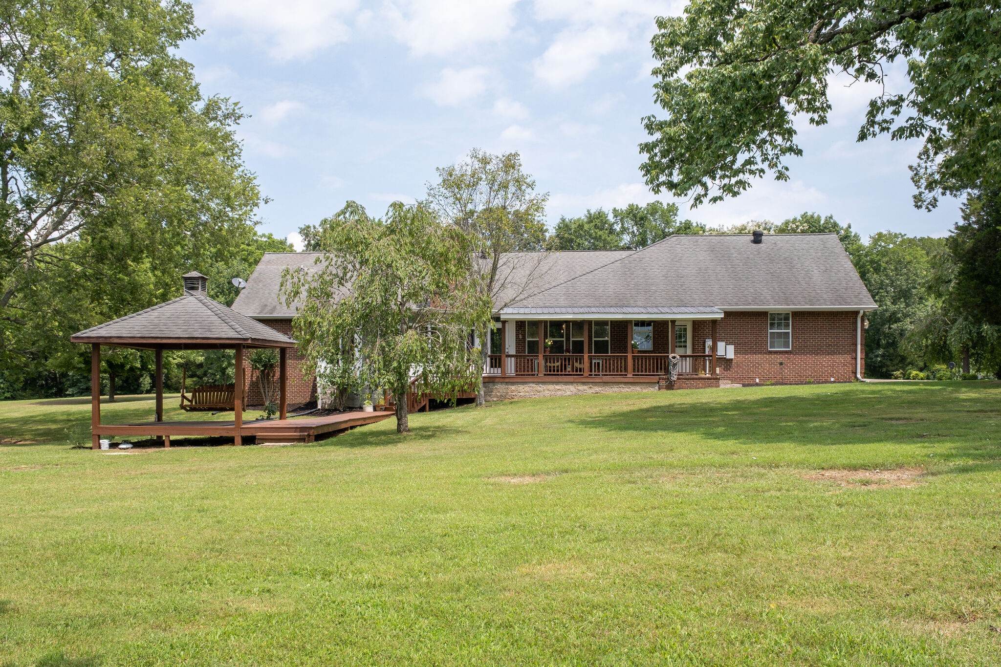 278 Vesta Road Lebanon, TN 37090 - Photo 34 of 44 a view of a house with a yard porch and sitting area
