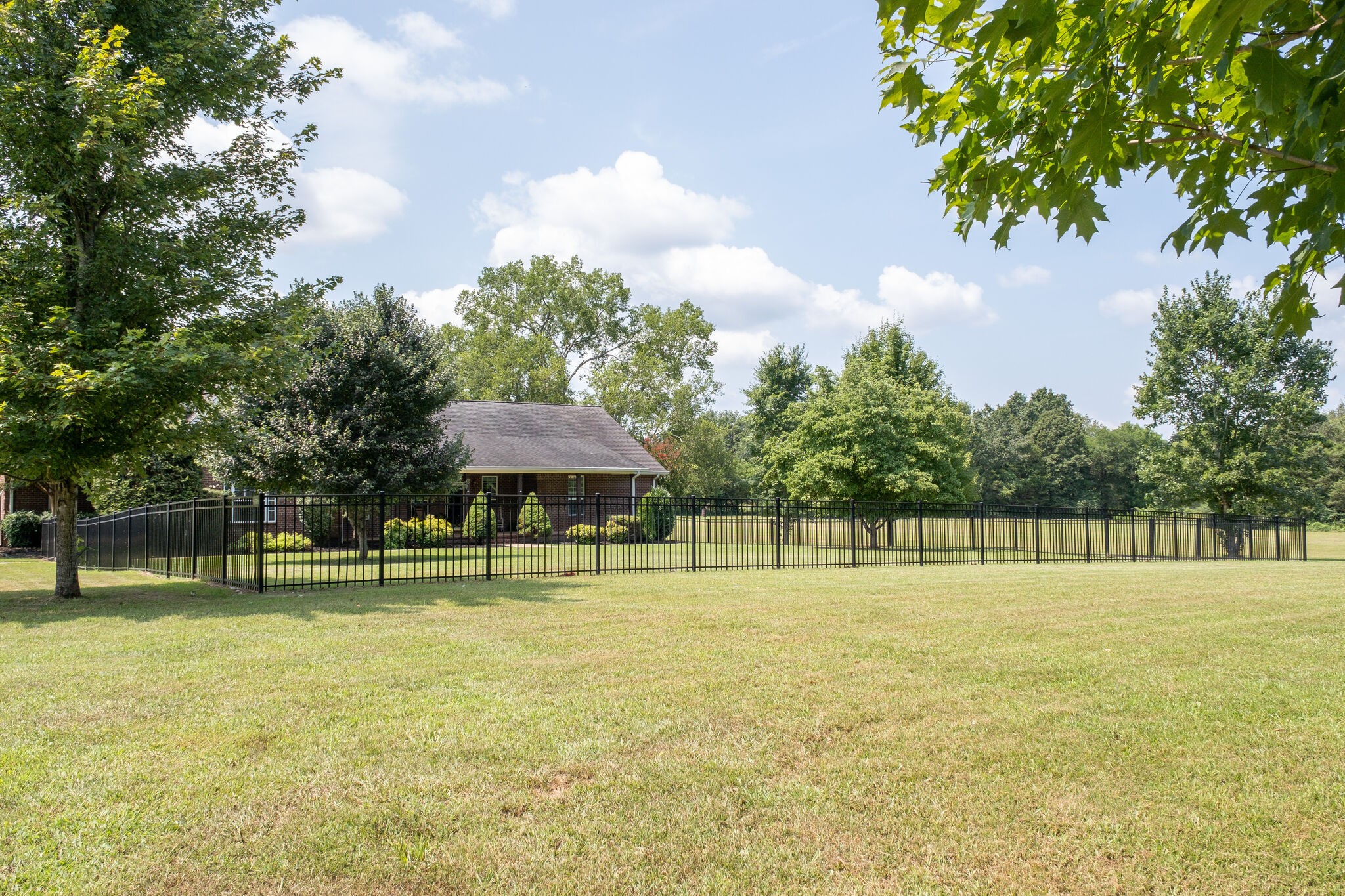 278 Vesta Road Lebanon, TN 37090 - Photo 6 of 44 a view of a swimming pool and a yard