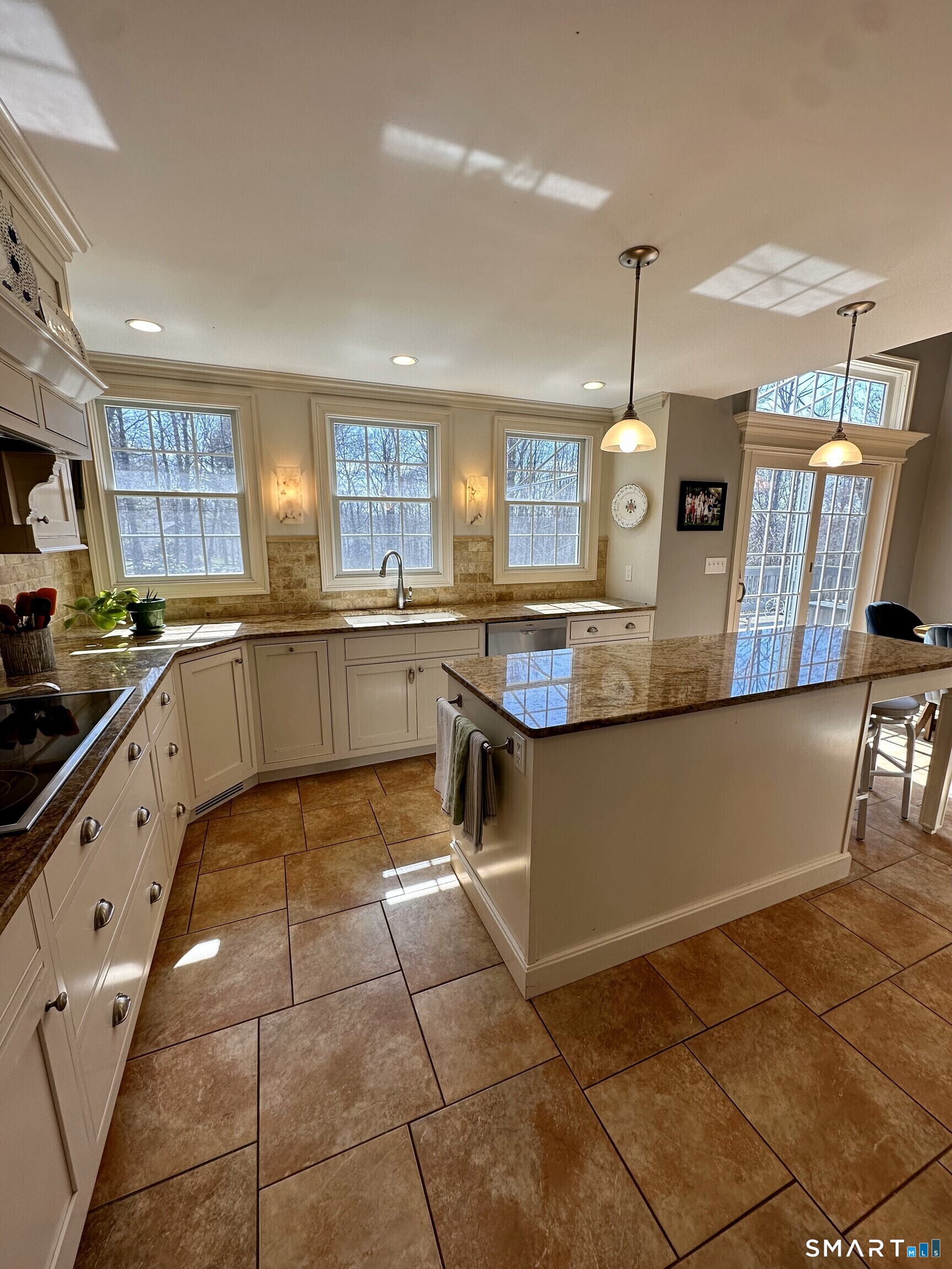 11 Van Campen Lane Bethel, CT 06801 - Photo 19 of 40 Kitchen with granite countertops and large island.