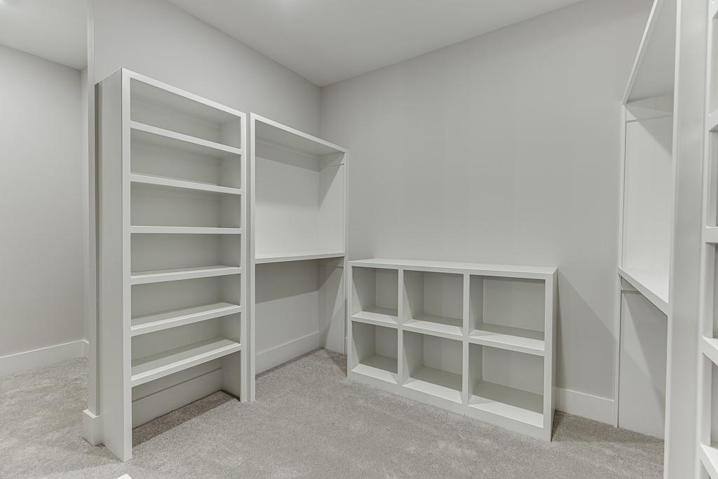 7620 Breeze Bay Road Cumming, GA 30041 - Photo 18 of 53 a view of an empty walk in closet