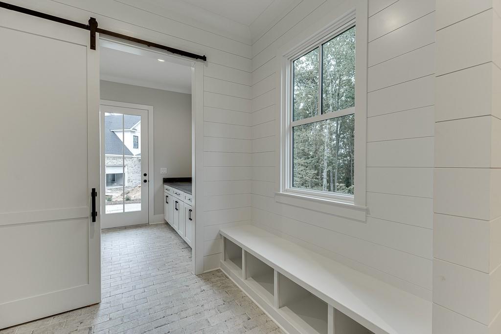 7620 Breeze Bay Road Cumming, GA 30041 - Photo 28 of 53 a view of an empty room with a window