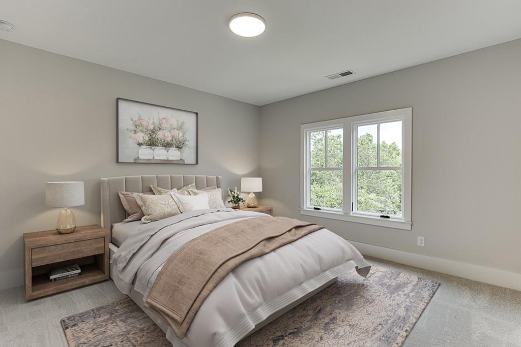 7620 Breeze Bay Road Cumming, GA 30041 - Photo 31 of 53 a bedroom with a bed and a window