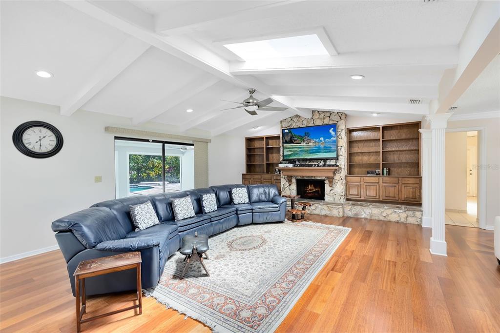 111 Variety Tree Circle Altamonte Springs, FL 32714 - Photo 7 of 35 The centerpiece of the family room is a floor to ceiling fireplace, perfect for cozy gatherings on chilly evenings.