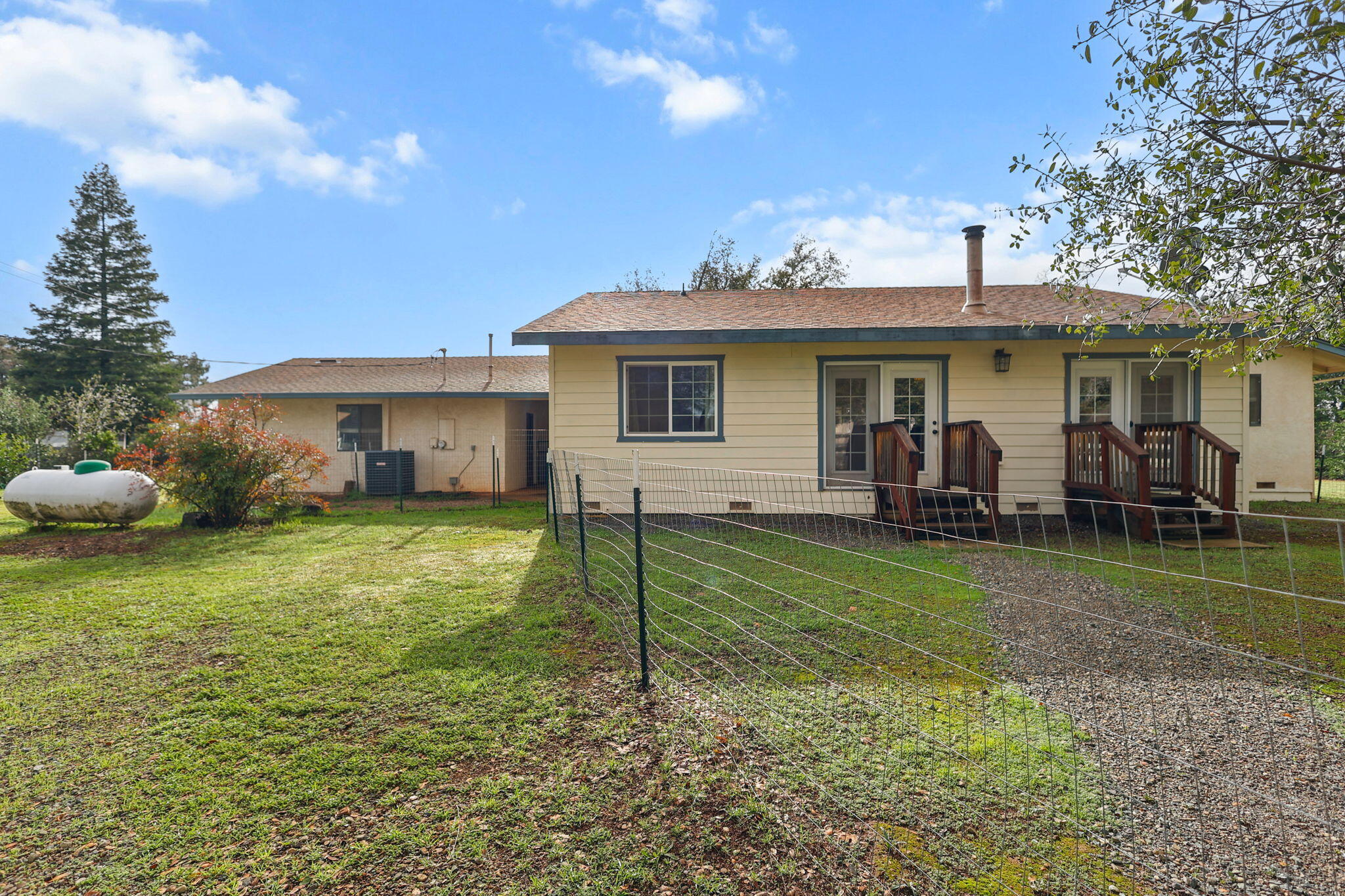 17618 Flowers Lane Anderson, CA 96007 - Photo 23 of 37 a view of a house with backyard