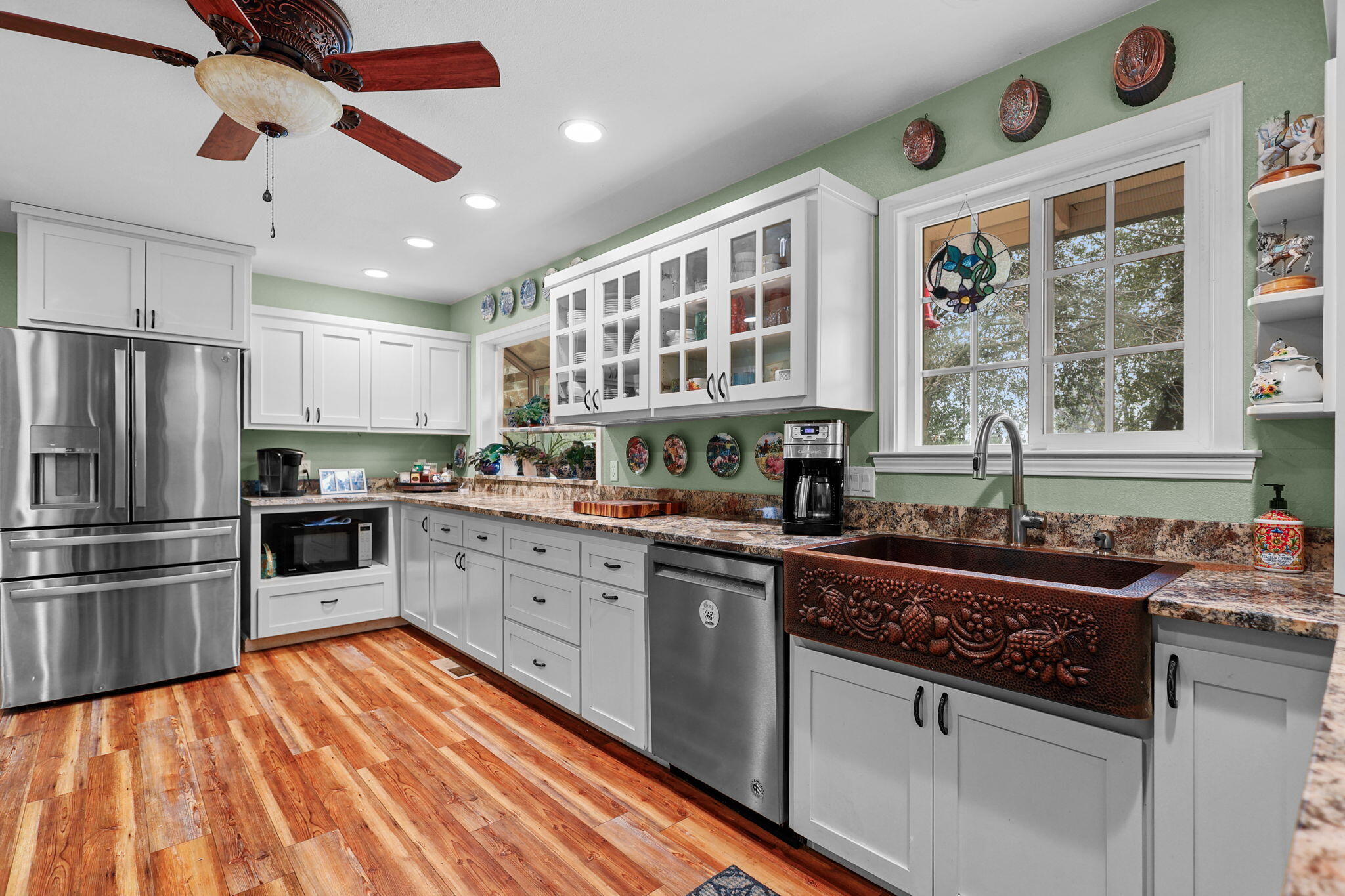 17618 Flowers Lane Anderson, CA 96007 - Photo 8 of 37 a kitchen with stainless steel appliances granite countertop a stove and a refrigerator