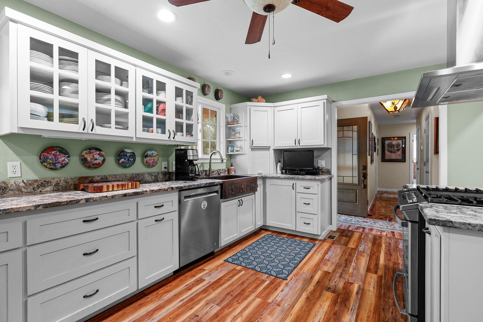 17618 Flowers Lane Anderson, CA 96007 - Photo 9 of 37 a open kitchen with stainless steel appliances granite countertop a stove and cabinets