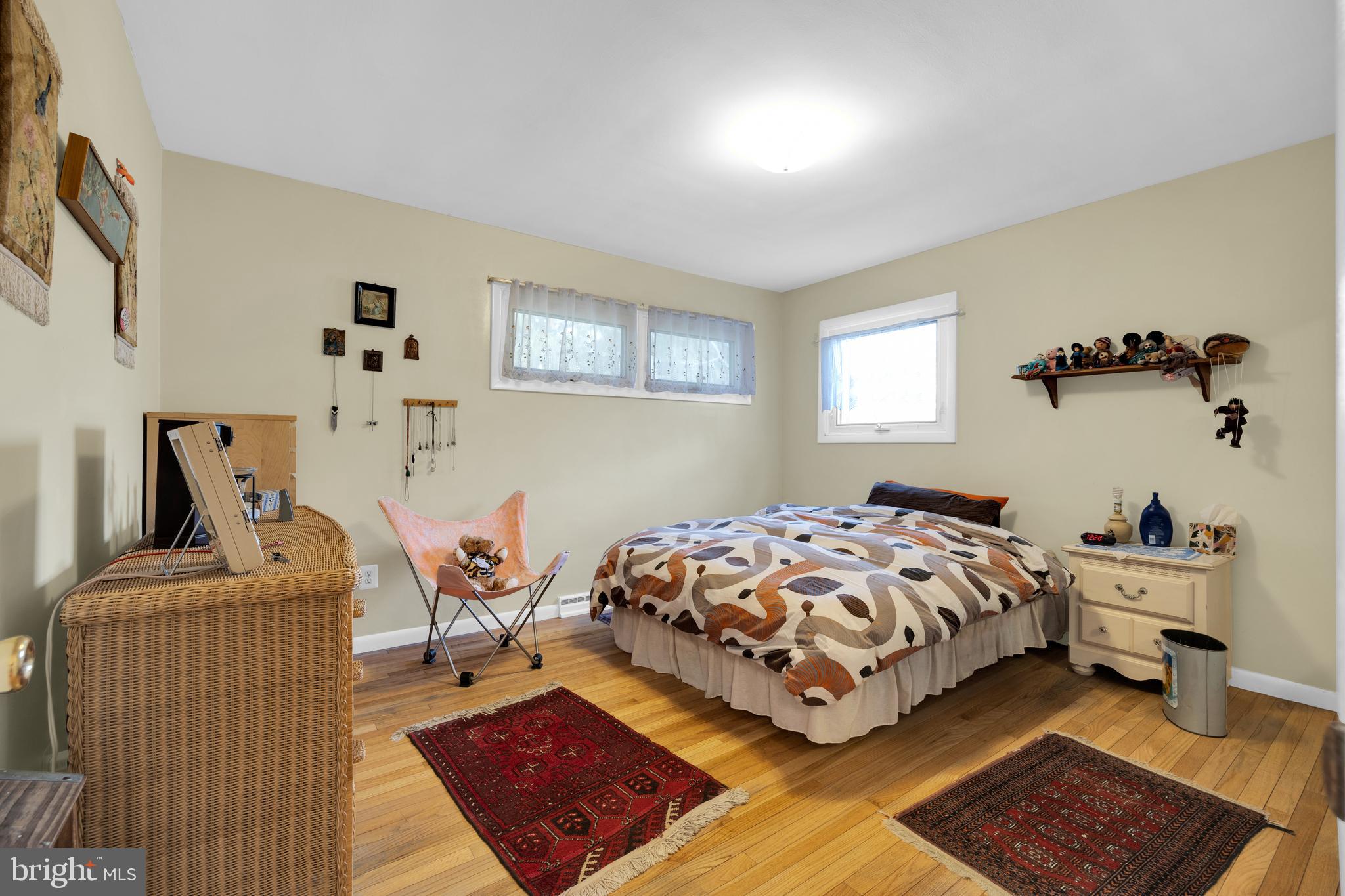 411 North Tulpehocken Road Reading, PA 19601 - Photo 15 of 27 a bedroom with a bed and wooden floor
