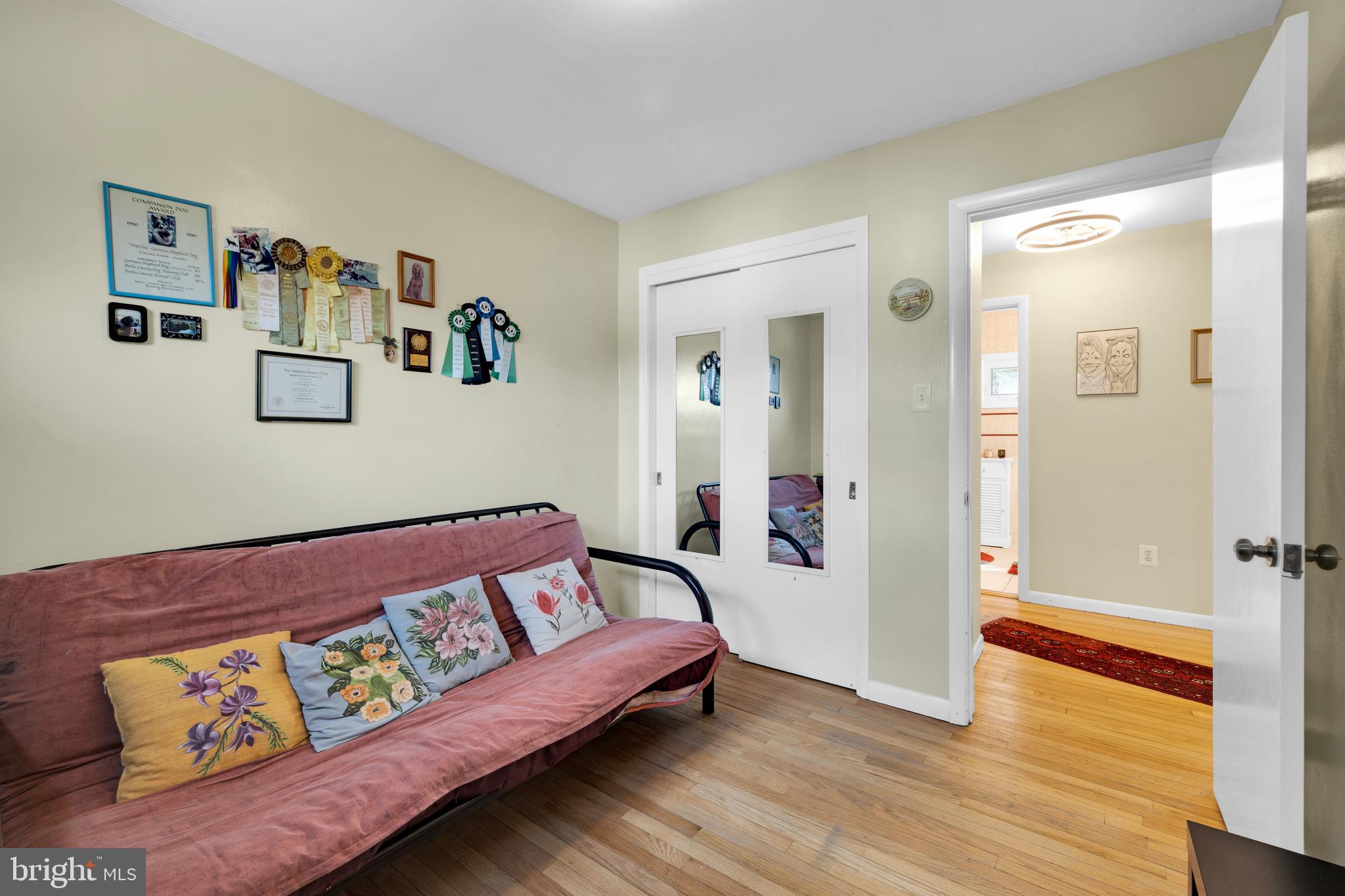 411 North Tulpehocken Road Reading, PA 19601 - Photo 17 of 27 a view of a bedroom with furniture and wooden floor