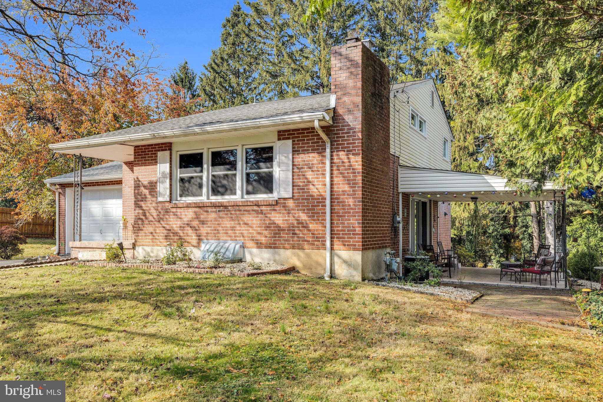 411 North Tulpehocken Road Reading, PA 19601 - Photo 2 of 27 a front view of a house with a yard