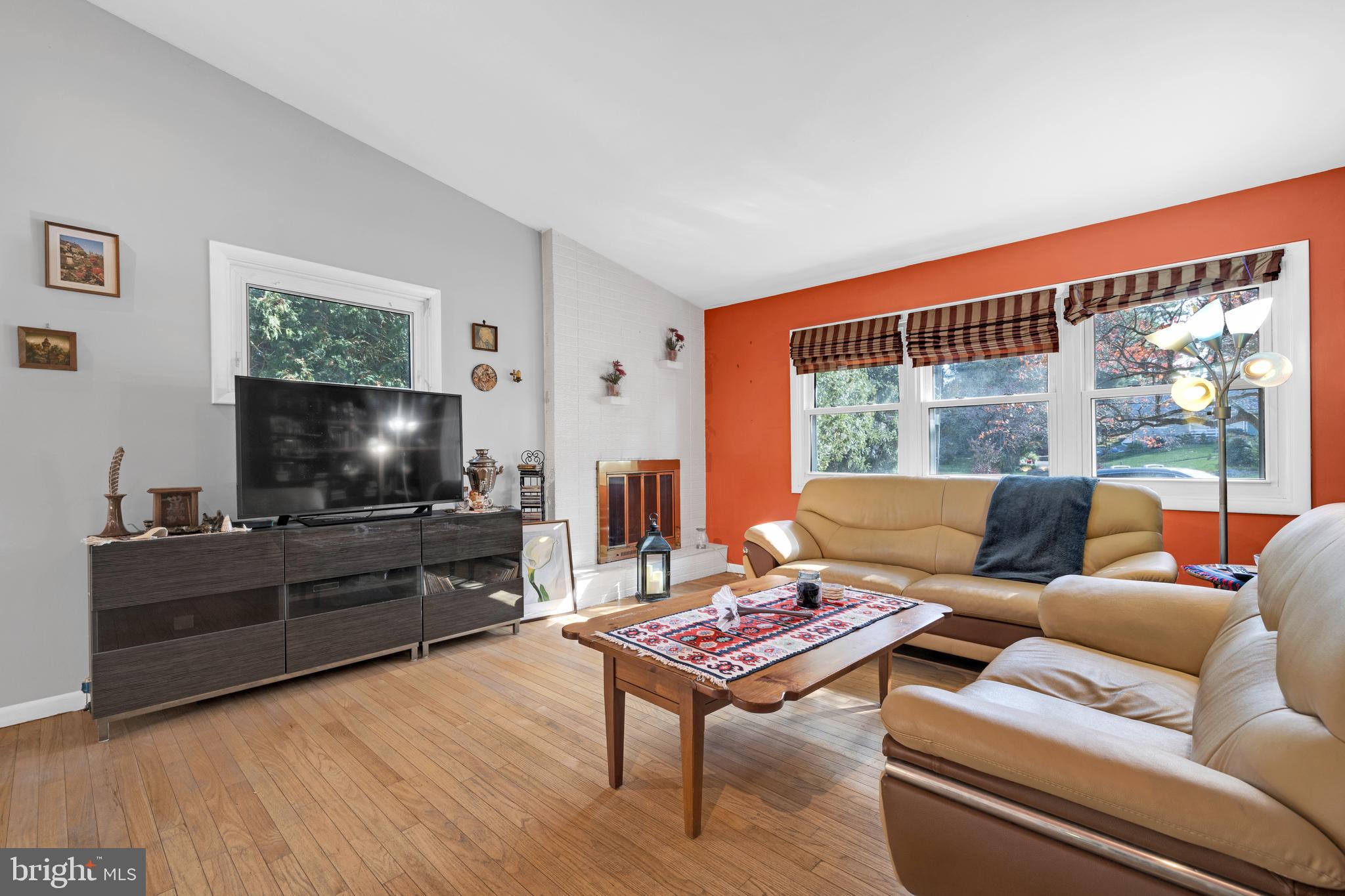 411 North Tulpehocken Road Reading, PA 19601 - Photo 5 of 27 a living room with furniture and a flat screen tv