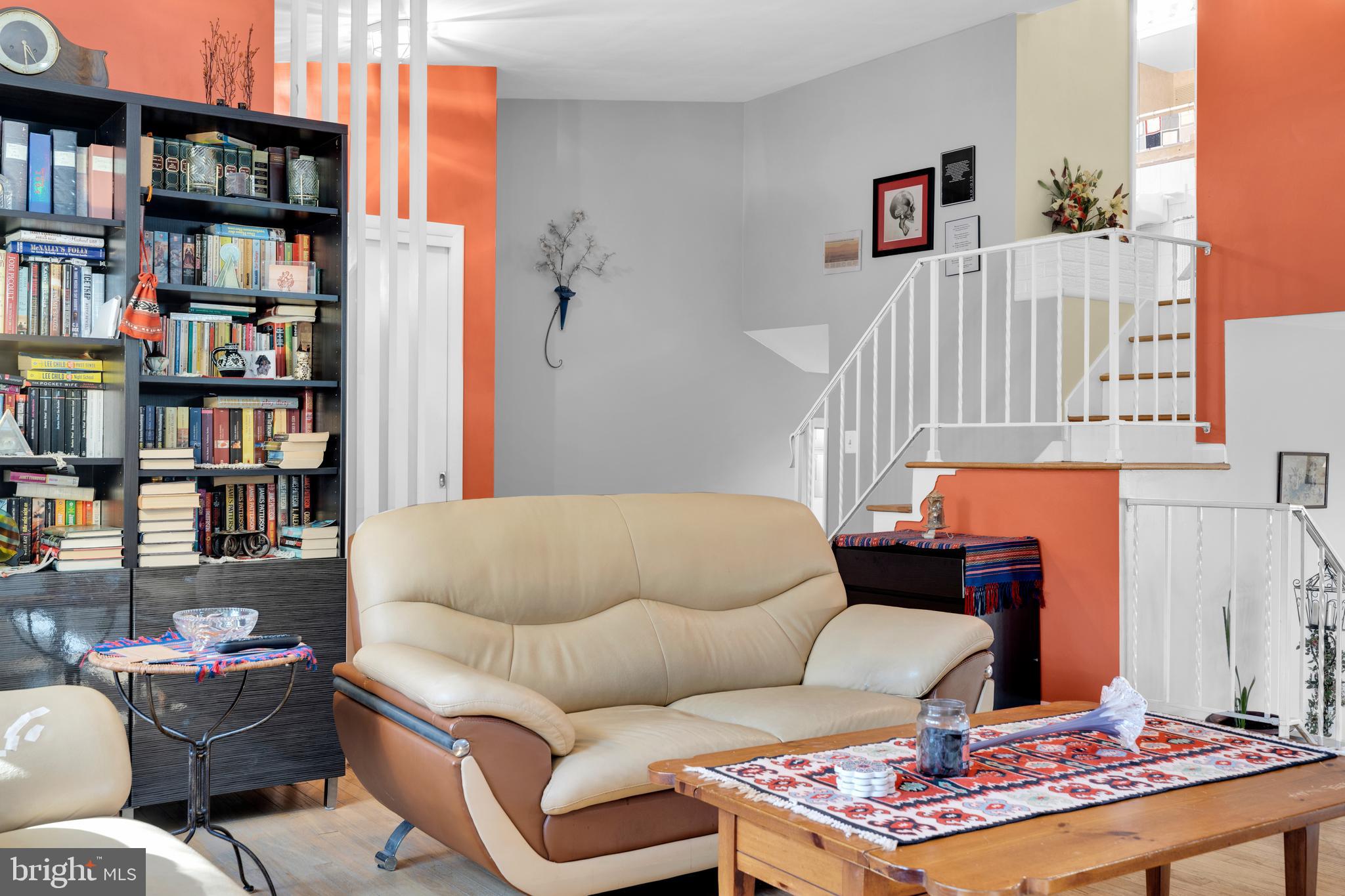 411 North Tulpehocken Road Reading, PA 19601 - Photo 7 of 27 a living room with furniture and a book shelf