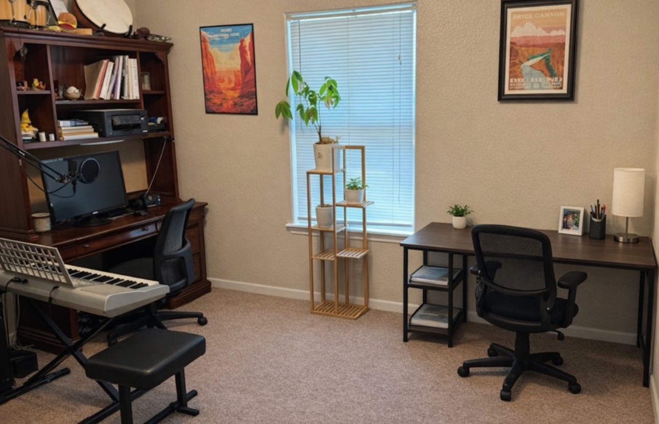106 Franklin Boulevard, Unit B Austin, TX 78751 - Photo 5 of 7 a view of a workspace with furniture and a bookshelf
