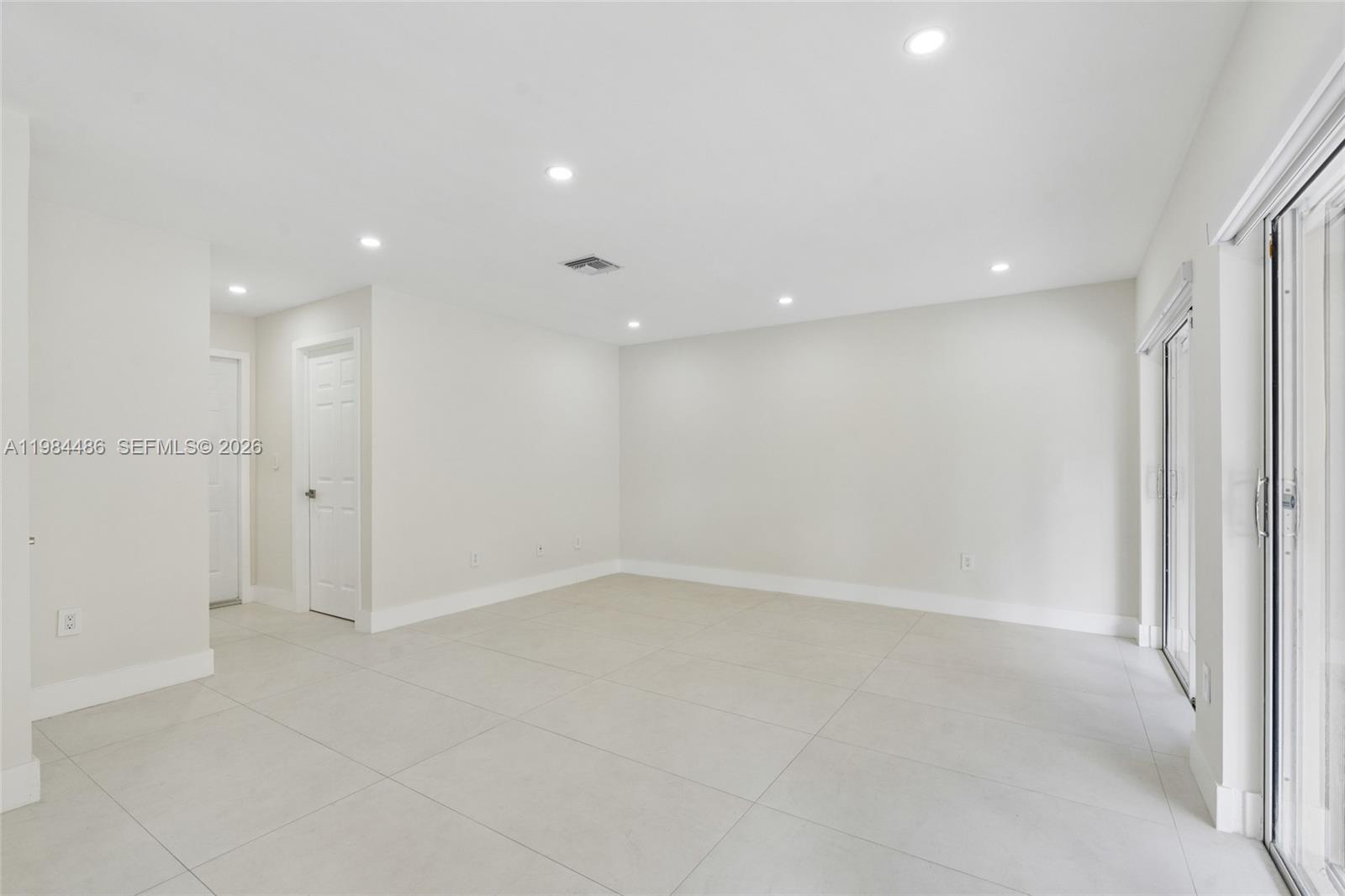 15174 Southwest 111th Street Miami, FL 33196 - Photo 14 of 49 a view of an empty room