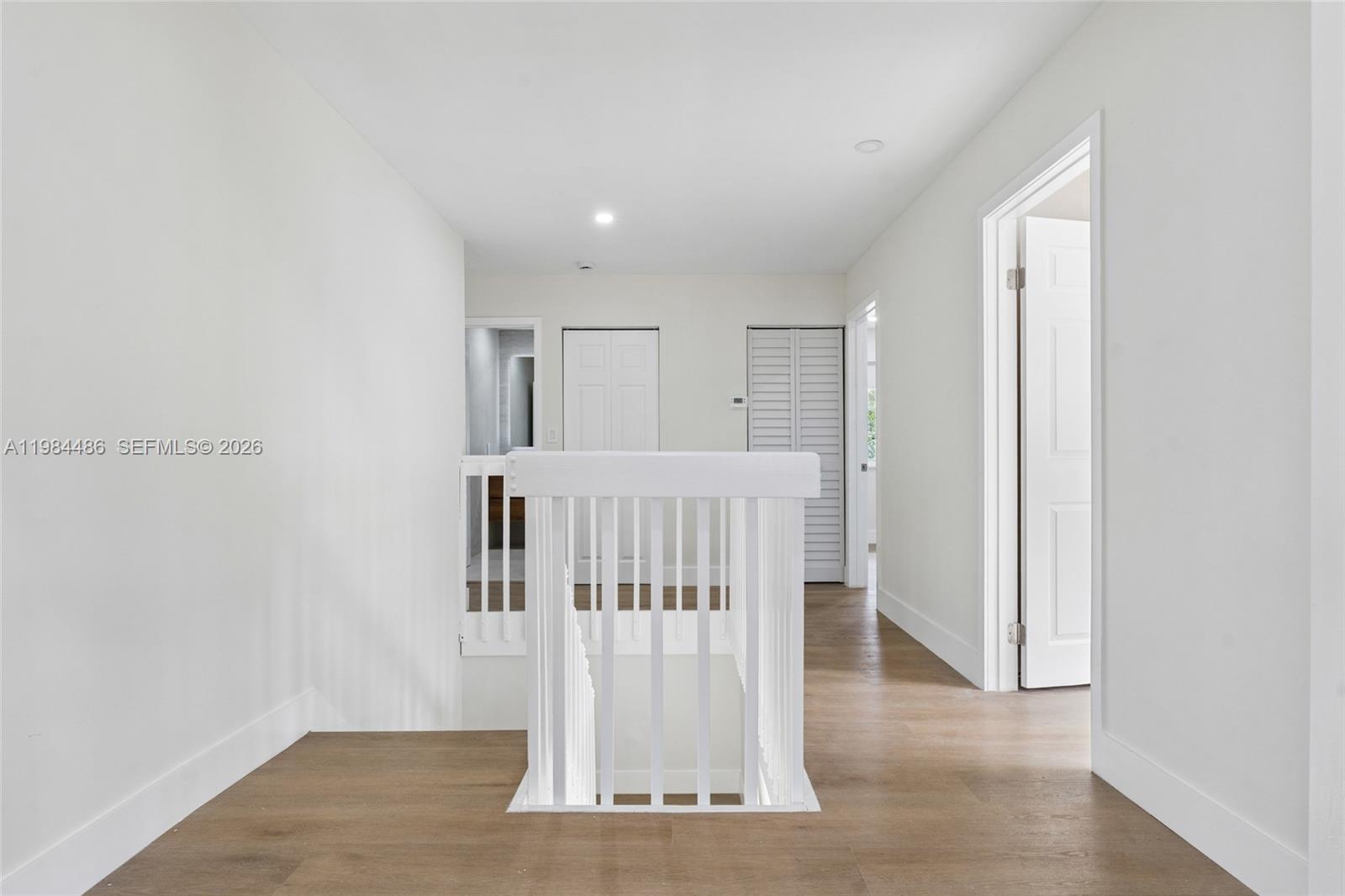 15174 Southwest 111th Street Miami, FL 33196 - Photo 18 of 49 a view of entryway with wooden floor