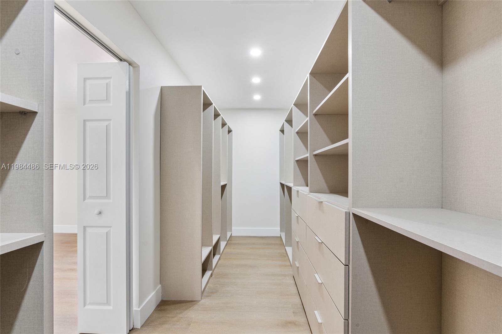 15174 Southwest 111th Street Miami, FL 33196 - Photo 24 of 49 a view of walk in closet with white walls